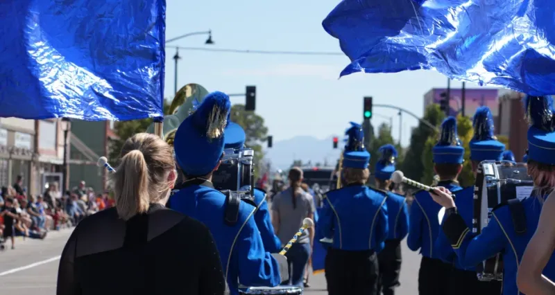 Marching band and parade flags at the Graham County Fair