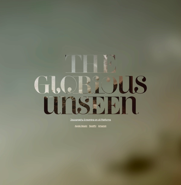 The Glorious Unseen website hero with the band's atmospheric wordmark